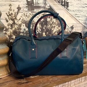 lululemon athletica Teal Leather Duffel with Black Strap and Pink Trim